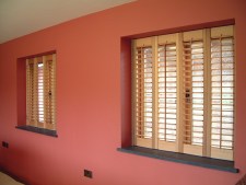 Oiled cedar full height interior shutters