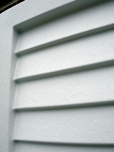 closed up louvred white marbella shutter