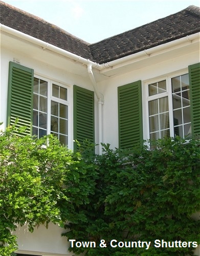 Home improvement on a budget with decorative plastic shutters