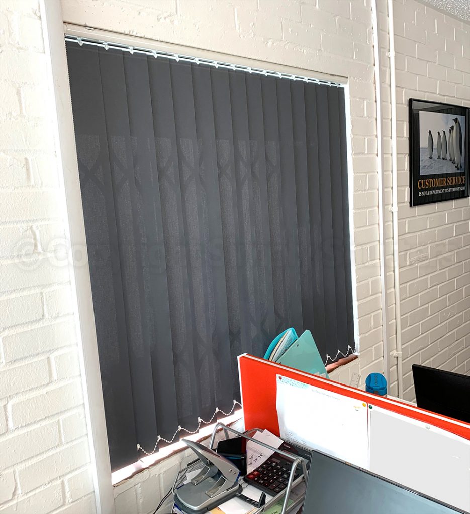 closed grey blinds over window 