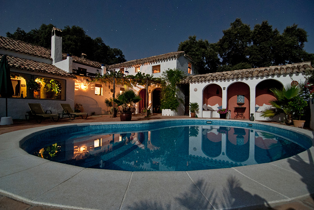 white villa home with swimming pool