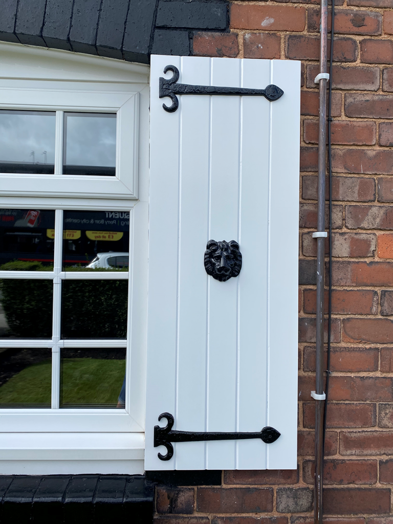 Decorative Hinges mounted onto an installed Town & country Synthetic shutter 